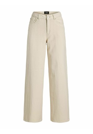Beige wide-leg pants with vertical seam details, front button, zip closure, and five pockets, labeled JJXX on waistband.
