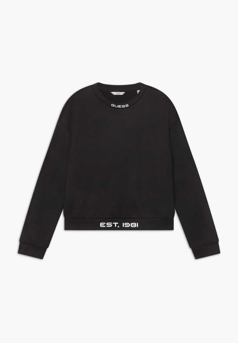 Sudadera negra recortada con mangas largas, cuello redondo y texto blanco "GUESS" en el cuello y "EST. 1981" en el dobladillo inferior.