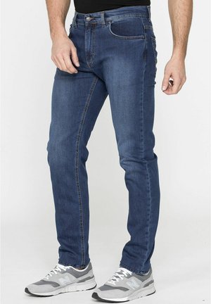 Jeans a sigaretta - lavaggio blu medio stone wash