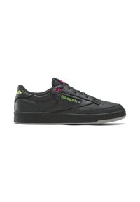 Black leather sneaker with a low-top design, featuring vibrant pink and green Reebok branding, textured side panels, and a rubber sole.