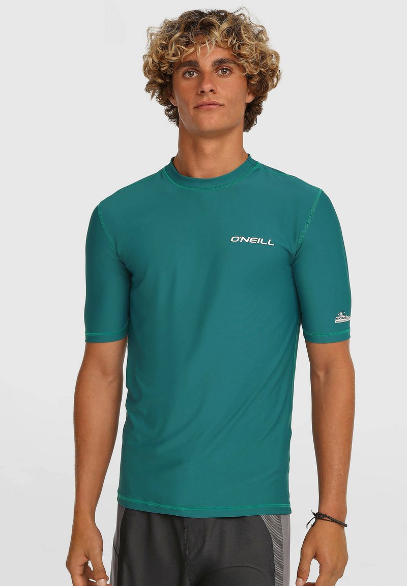 Kratka majica za zaščito pred soncem z rokavi do komolcev v modro-zeleni barvi, s šivi z ravnim zaključkom, logotipom O'Neill na prsih in rokavu, izdelana iz raztegljivega materiala, ki se hitro suši.