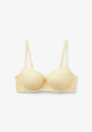 Sujetador de encaje color crema con aro, tirantes ajustables y bordado floral en las copas y la banda, mostrado sobre fondo blanco.