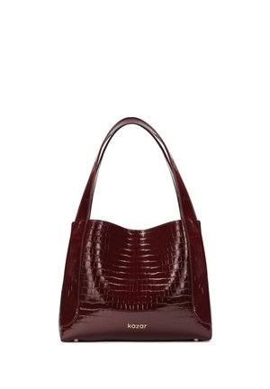 Burgundy patent leather handbag with a croc-embossed texture, featuring an arched silhouette and two wide, rounded straps. Gold branding accent.