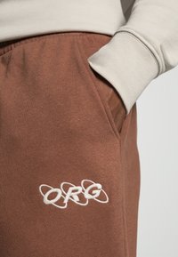 Jack & Jones JJIKANE ELLIOT  - Calças de fato de treino - aztec