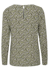 Langærmet bluse med et grønt blomstermønster og hvide og sorte accenter. Ryggen har en splitdetalje med en lille knaplukning ved nakken.
