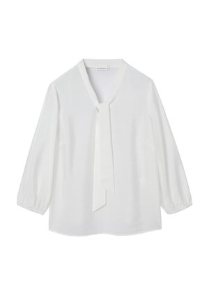 Blusa blanca de manga larga con cuello en V y lazo incorporado, con puños ligeramente fruncidos y un ajuste holgado.
