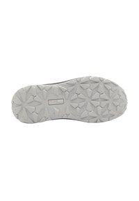 White rubber shoe sole with textured, star-shaped tread pattern. Brand name "Jack Wolfskin" is embossed in the center.