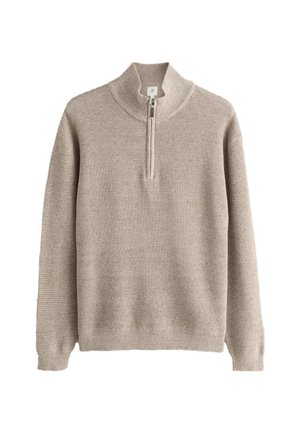 Beige knit sweater with long sleeves and a short front zipper extending from a ribbed stand-up collar.