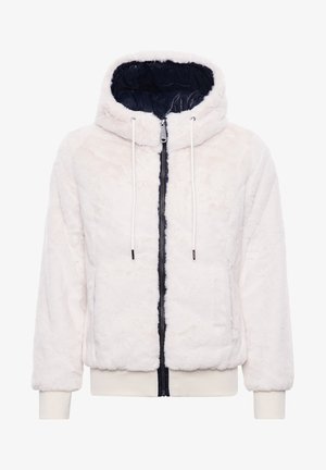 Veste en fausse fourrure blanche avec doublure marine, capuche, fermeture éclair à l'avant, et poignets et ourlet élastiqués. Comprend des cordons de serrage à l'ouverture de la capuche.