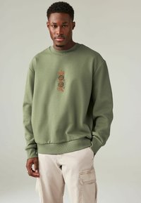Next PRINTED CREW - REGULAR FIT - Sportinis megztinis - green