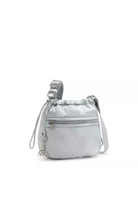 Light gray nylon crossbody bag with adjustable strap, front zip pocket, and elephant keychain charm.