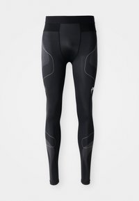Sorte atletiske leggings lavet af strækbart materiale, med en bred talje, mesh-paneler og reflekterende detaljer langs siderne.