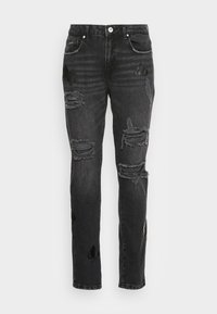 Černé džíny z denimu s poškozenými dírami a záplatami. Mají rovný střih a tradiční pětikapsový styl.