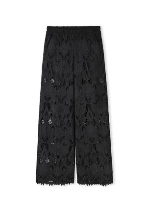 Zwarte wijde broek van kant met bloemmotieven. Voorzien van een elastische tailleband en een scalloped zoom. Semi-doorschijnende textuur.