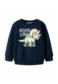 Felpa blu navy con grafica di un dinosauro che raffigura un triceratopo, testo "ROAR VIBE", polsini a costine e design con collo tondo.