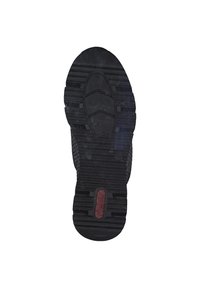Black rubber shoe sole with a textured grip pattern and a central logo section. The design features a rounded shape and defined tread lines.