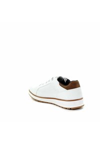 White sneaker with brown heel patch, perforated side panels, white laces, and brown-trimmed sole, angled showing back and outer side.