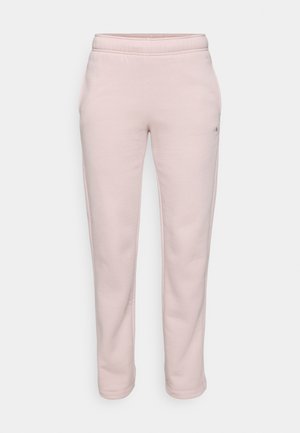 Pantaloni de trening roz deschis, confecționați dintr-un material moale, având o tăietură relaxată, un elastic la talie și buzunare laterale. Fără modele vizibile sau accesorii.