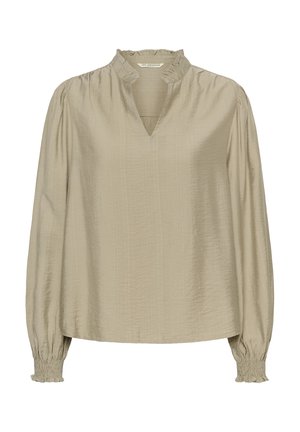 Hosszú ujjú, világos bézs blúz puha anyagból, fodros gallérral, V-alakú nyakkivágással és rakott mandzsettákkal a kényelmes fazonért.
