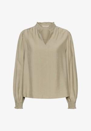 Hosszú ujjú, világos bézs blúz puha anyagból, fodros gallérral, V-alakú nyakkivágással és rakott mandzsettákkal a kényelmes fazonért.