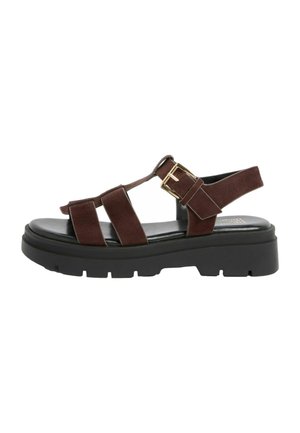 Pruun seemisnahast avatud varbaga sandaal kolme rihmaga, kuldse pandlaga pahkluu rihmas ja paksu musta soonilise tallaga.