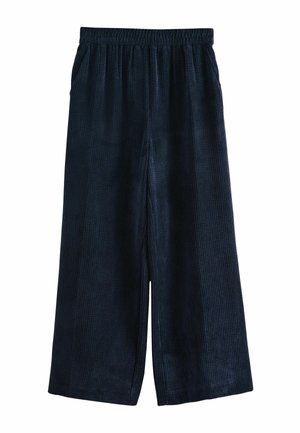 Pantalones de pierna ancha de un azul oscuro texturizado con una cinturilla elástica y bolsillos laterales, que presentan un sutil canalé vertical para un detalle adicional.