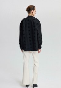 Touché Privé Bomber Jacket - black