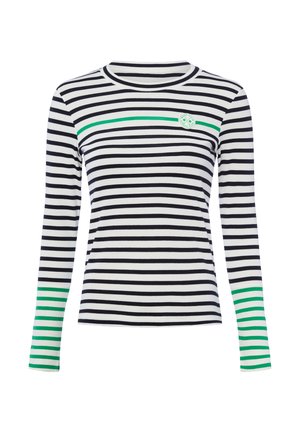 Chemise à manches longues, col rond, avec des rayures horizontales noires et blanches, une bande verte traversant la poitrine, et des poignets rayés verts sur les manches.