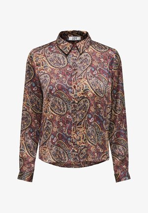 Camisa de manga larga con botones y patrón de paisley multicolor en tonos marrón, amarillo, azul y rojo, con cuello puntiagudo.