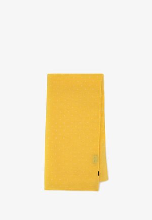 Bufanda de algodón amarilla con una textura suave, que presenta pequeños lunares rosas. Forma rectangular con una etiqueta en un lado.