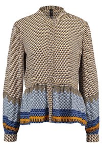Musterbluse mit einer Mischung aus geometrischen Formen in Braun, Blau und Gelb. Lange Ärmel, runder Kragen und gesmokte Taillenpartie.