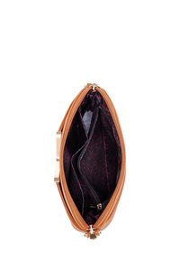 Tan leather handbag, zip closure, textured exterior, black lining with red geometric pattern, multiple interior compartments, gold-toned hardware.