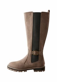 Tall brown boots with a smooth leather exterior, black elastic paneling, and a decorative buckle. Textured sole for traction.