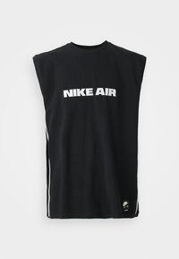 Črna brezrokavna majica Nike Air z belim napisom logotipa centriranim na prsih in majhno črno oznako Nike Air blizu spodnjega roba.