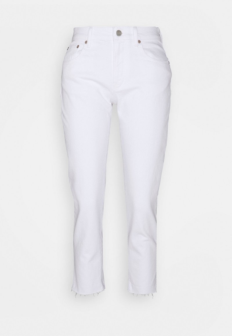 Witte denim jeans met een slanke pasvorm, vijfzakkenontwerp en een rafelige zoom. Voorzien van een metalen knoopsluiting en subtiele stikseldetails.