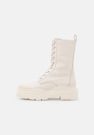 Bottes à plateau - white