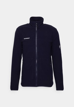 Navy fleece jacket with high collar, full zipper, and two front pockets. Features "MAMMUT" logo on chest and round logo on left sleeve.