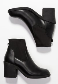 Even&Odd Tronchetti - black