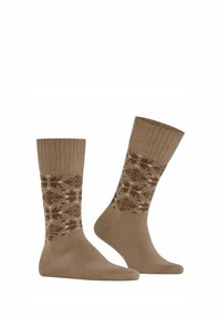Chaussettes en tricot marron avec un bord côtelé, ornées d'un motif géométrique en marron foncé et crème. Conçues pour le confort et la chaleur.