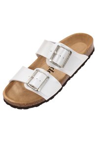 Sandales blanches avec deux sangles réglables, boucles en argent et une semelle en liège. La semelle est noire et texturée pour une meilleure adhérence.