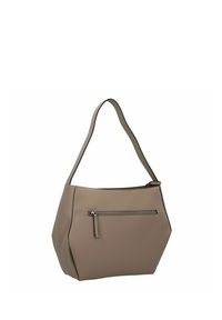 Tote-Bag aus tanfarbenem Leder mit geometrischer Form, ausgestattet mit einer vorderen Reißverschlusstasche und einem einzelnen Schultergurt. Die strukturierte Oberfläche verleiht Details.