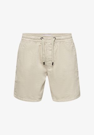 Shorts de baie bej deschis dintr-un material texturat, având o talie elastică cu șnur și cusături laterale subtile.