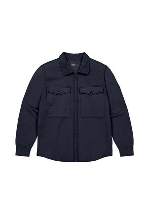 Donkerblauwe button-up jas met een rits aan de voorkant, twee borstzakken, lange mouwen en een puntige kraag. Gemaakt van gestructureerde stof.