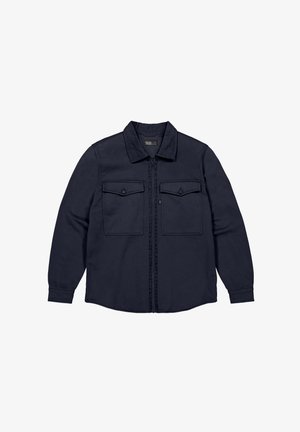 Donkerblauwe button-up jas met een rits aan de voorkant, twee borstzakken, lange mouwen en een puntige kraag. Gemaakt van gestructureerde stof.