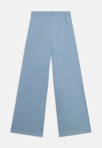 adidas Originals WIDE LEG PANTS JUNIOR - Spodnji deli trenirk - tactile blue/white