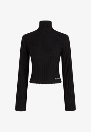 Juodas kanalėlis su ilgomis rankovėmis, trumpa dizaino forma ir subtilus logotipas apačioje. Minkšta mezginio tekstūra.