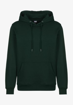 Tumši zaļš kapucis, izgatavots no mīkstas auduma. Satur priekšējo kabatu, regulējamu kapuci un ribu aproces un apakšmalu. Vienkāršs, klasiskas dizains.