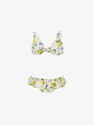 Dvodelni bikini z rumenimi limonami, modrimi morskimi zvezdami in cvetličnimi vzorci na krem tkanini, s topom z vozlom in spodnjim delom z volančki.