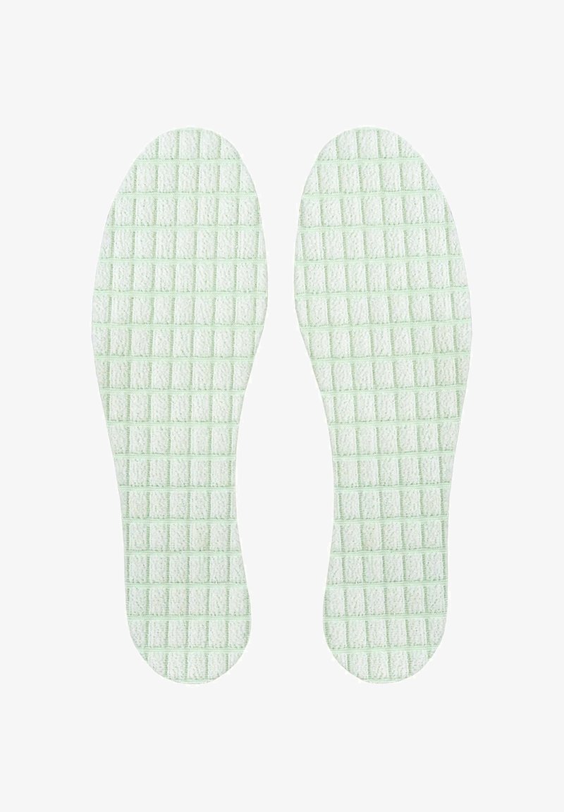 Zelene teksturirane vložke s mrežnim vzorcem, izdelane iz mehke snovi, zasnovane za udobje in podporo v obuvalih.