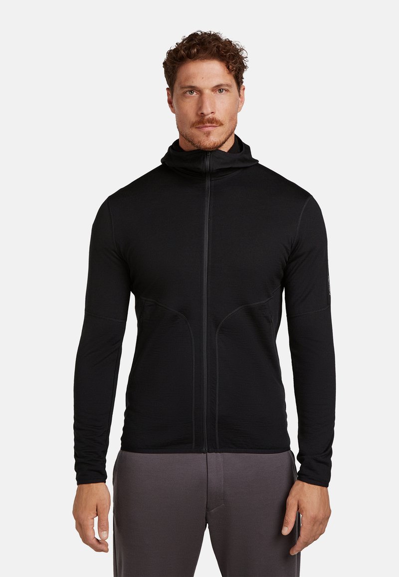 Felpa nera con zip in tessuto leggero, con maniche lunghe, collo alto e dettagli di cuciture a contrasto.